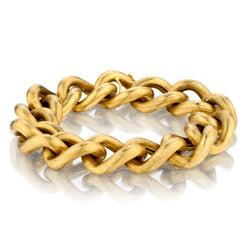 18kt Yellow Gold Textured 'Macaroni' Bracelet Weight: 55.81 grams.