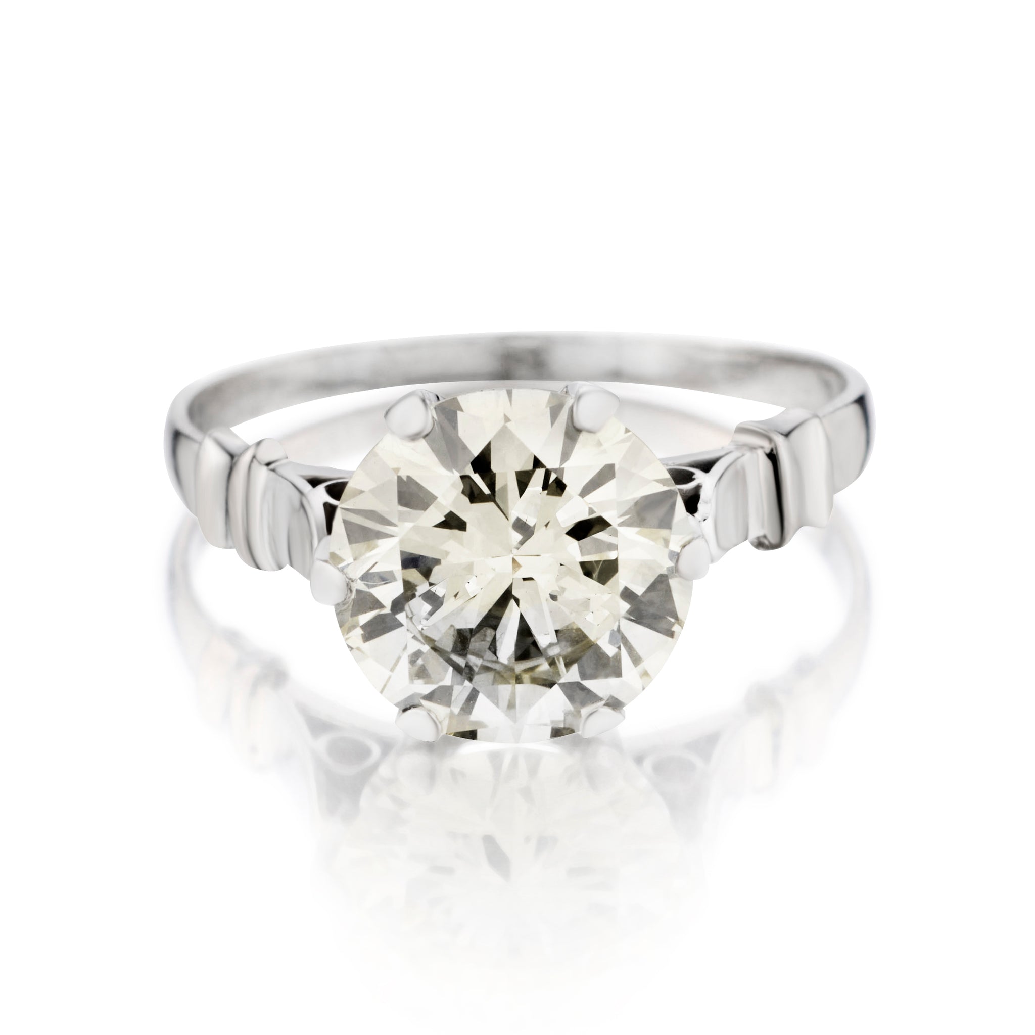 Platinum Fancy Yellow Brilliant Cut Diamond. 3.75ct Weight