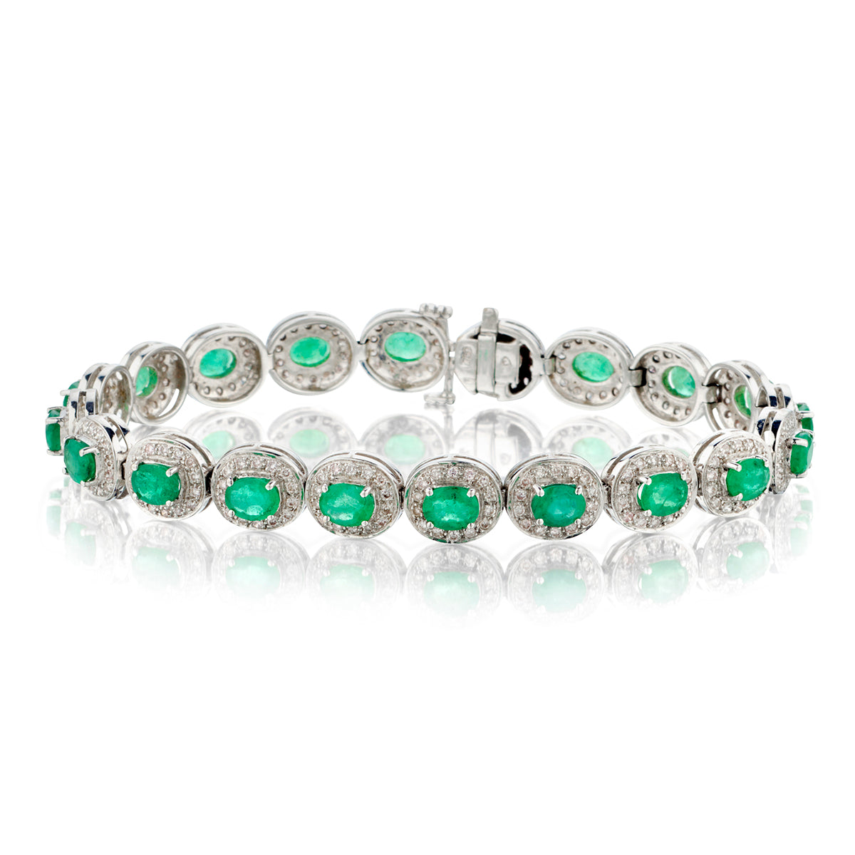 18kt White Gold Green Emerald and Diamond Bracelet.