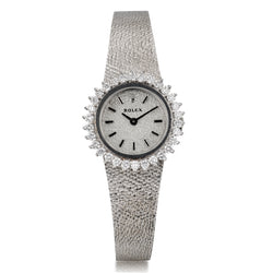 Ladies 18kt White Gold Rolex Dress Watch with Diamond Bezel.