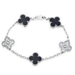 Van Cleef & Arpels Onyx and Diamond Vintage Alhambra Bracelet. Ref: VCAR2R900