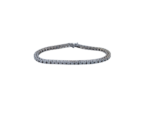 14kt WHITE GOLD DIAMOND TENNIS BRACELET 52 x 3.92CT TW.
