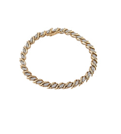 14KT YELLOW GOLD VINTAGE STYLE S-LINK TENNIS BRACELET.