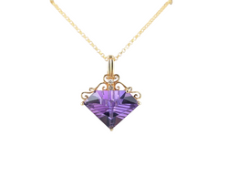 14kt YELLOW GOLD AMETHYST AND DIAMOND PENDANT.
