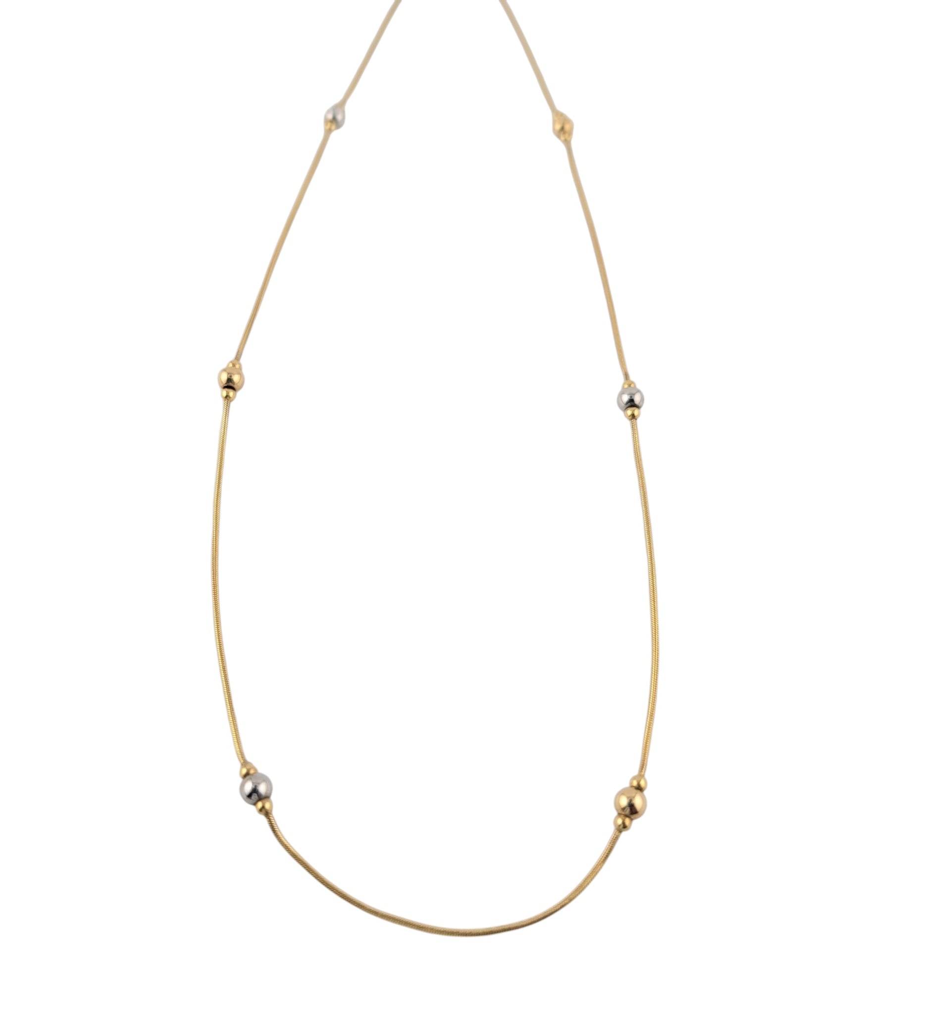 14KT YELLOW & WHITE GOLD BEAD NECKLACE.