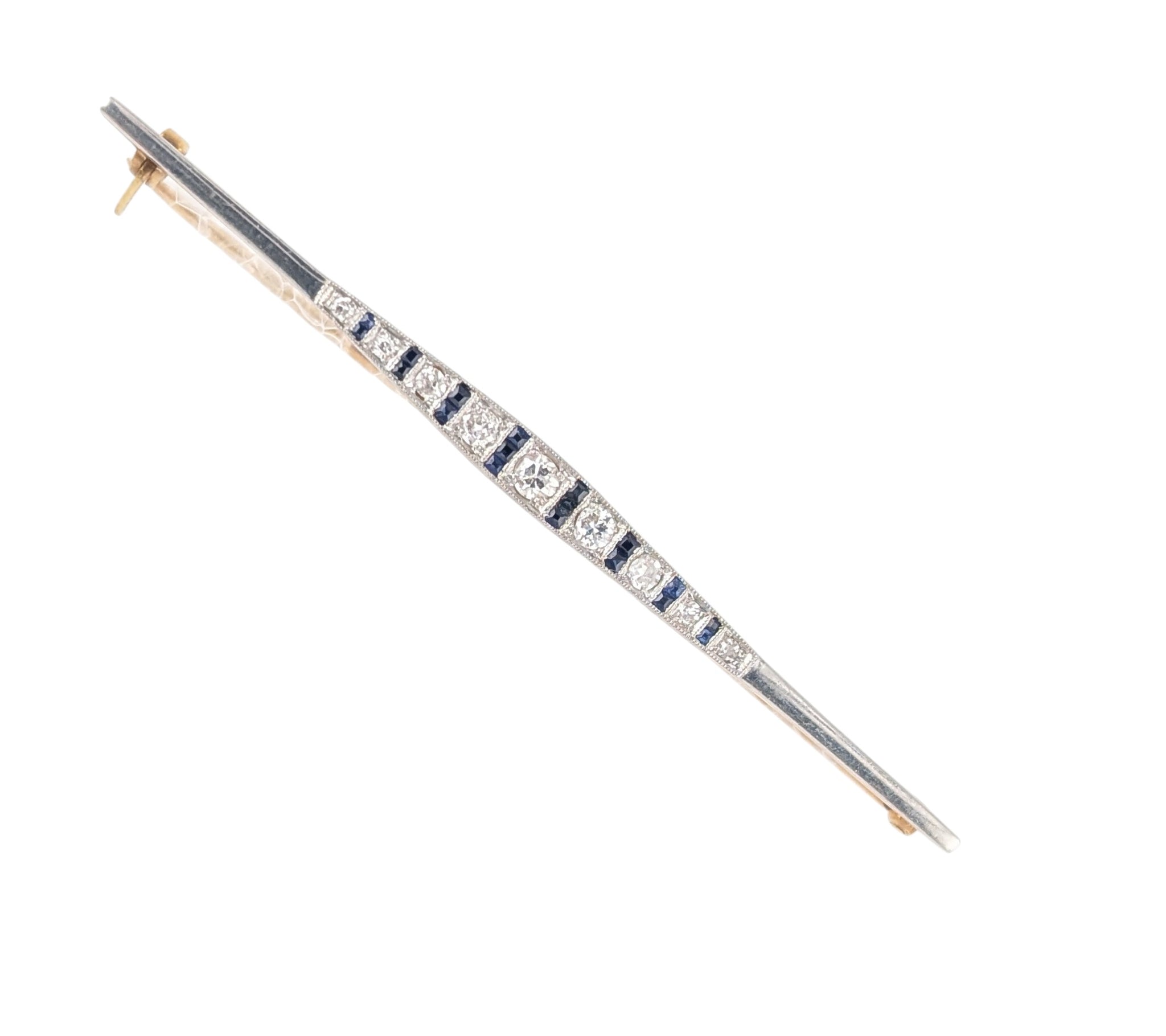 18KT YELLOW GOLD  & PLATINUM ART DECO DIAMOND AND SAPPHIRE BAR BROOCH.