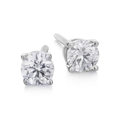 Tiffany & Co. 0.35 Carat Total Round Brilliant Cut Diamond Studs..