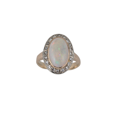 10KT YELLOW GOLD OPAL AND DIAMOND RING.