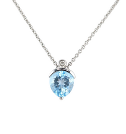 14KT WHITE GOLD BLUE TOPAZ PENDANT WITH CHAIN.