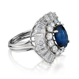 Ladies Platinum Blue Sapphire and Diamond Ballerina ring.
