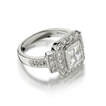 Platinum and Diamond Ring. 1.14ct Tw Princess and Brilliant Cut Diamonds.