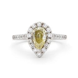 0.60 Carat Natural Light Fancy Yellow Pear-Shaped Diamond Halo Ring