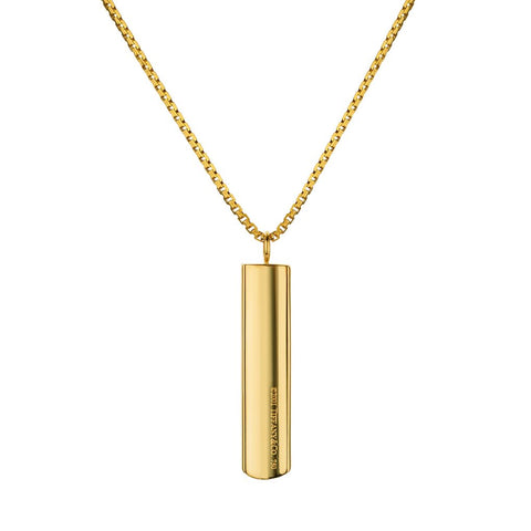 Tiffany & Co Bar Pendant on 14kt Yellow Gold Chain.