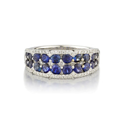 Ladies 18kt White Gold Blue Sapphire and Diamond Band.