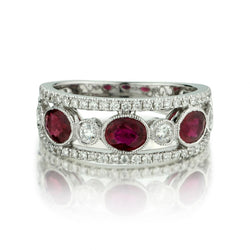 18KT White Gold Oval Rubies And Round Brilliant Cut Diamond Ring