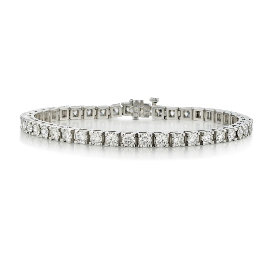 Ladies 14kt White Gold Diamond "Tennis Bracelet". 53 x 5.55ct Tw