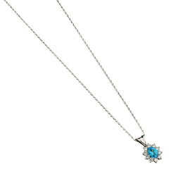 1.10 Carat Blue Topaz And Diamond Halo Pendant Necklace