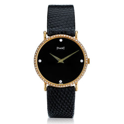 Ladies Piaget Onyx and Diamond Dress Watch.