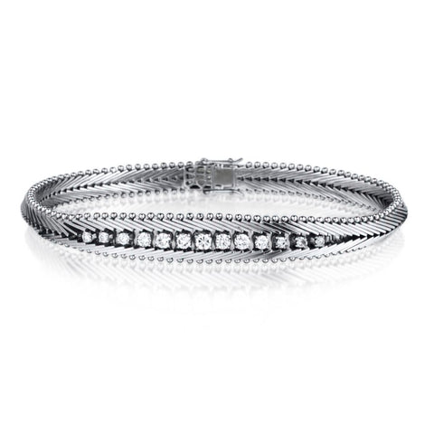 Ladies 14kt White Gold and Diamond Herring Bone Bracelet. 0.65ct Tw